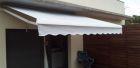 Toldo brazos articulados color gris nube