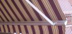 Toldo brazos invisibles de aluminio